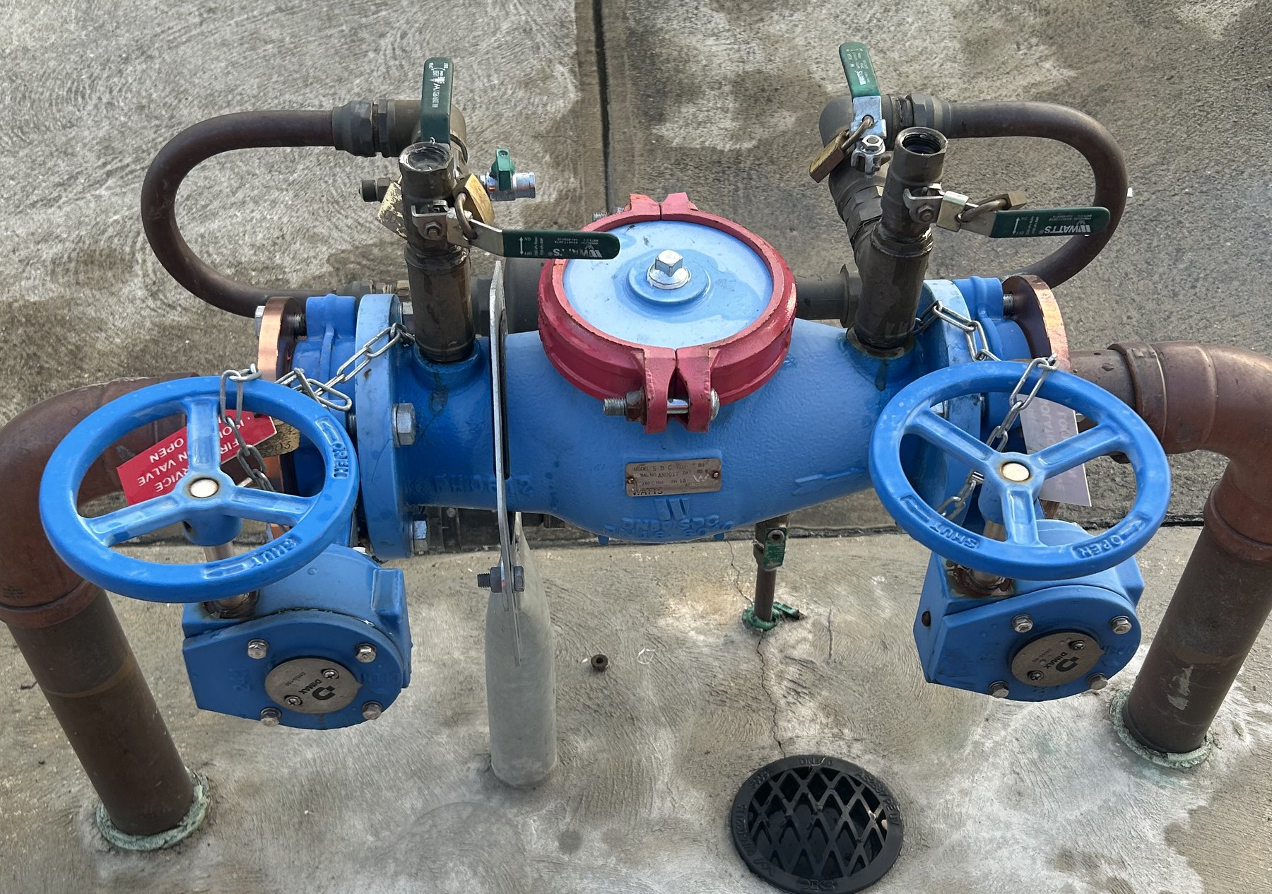 Commercial backflow prevention assembly installed by Free Flow, service tags fitted